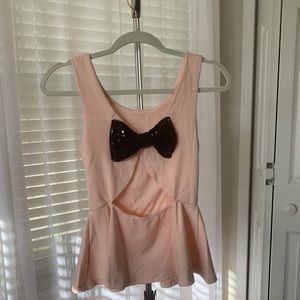 Pink with black sequin bow peplum top small